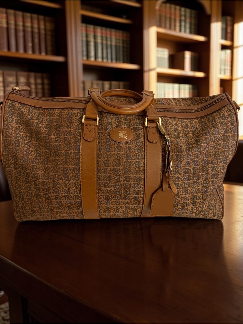 Burberrys Brown Monogram Canvas Travel Weekender with Tan Leather Trim